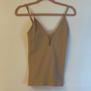 Cute stretchy light pink/tan top from free people